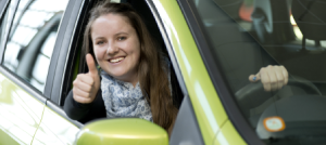 Woman In Her Car After She Received A Tyre Service